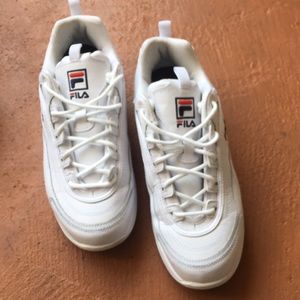Women’s Fila white sneakers/tennis shoes. Size 10. Only worn once.